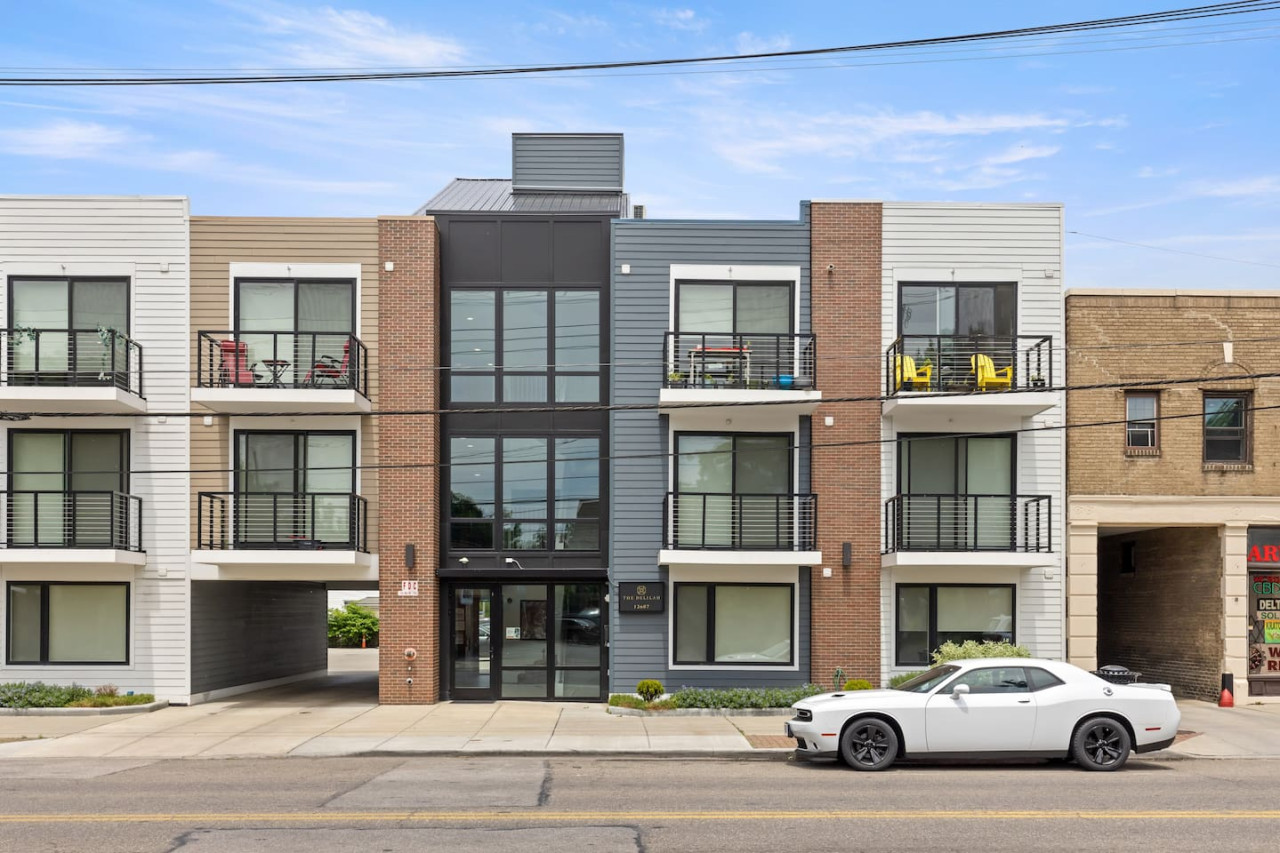 The house’s exterior is a blend of modern and classic design elements, creating a welcoming and stylish facade.