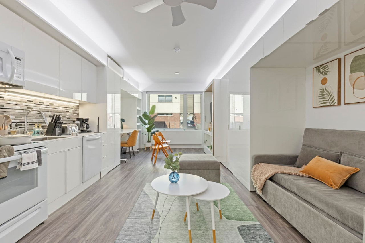 Once you enter the living room you'll find a space that feels both luxurious and cozy, perfect for unwinding after a long day.