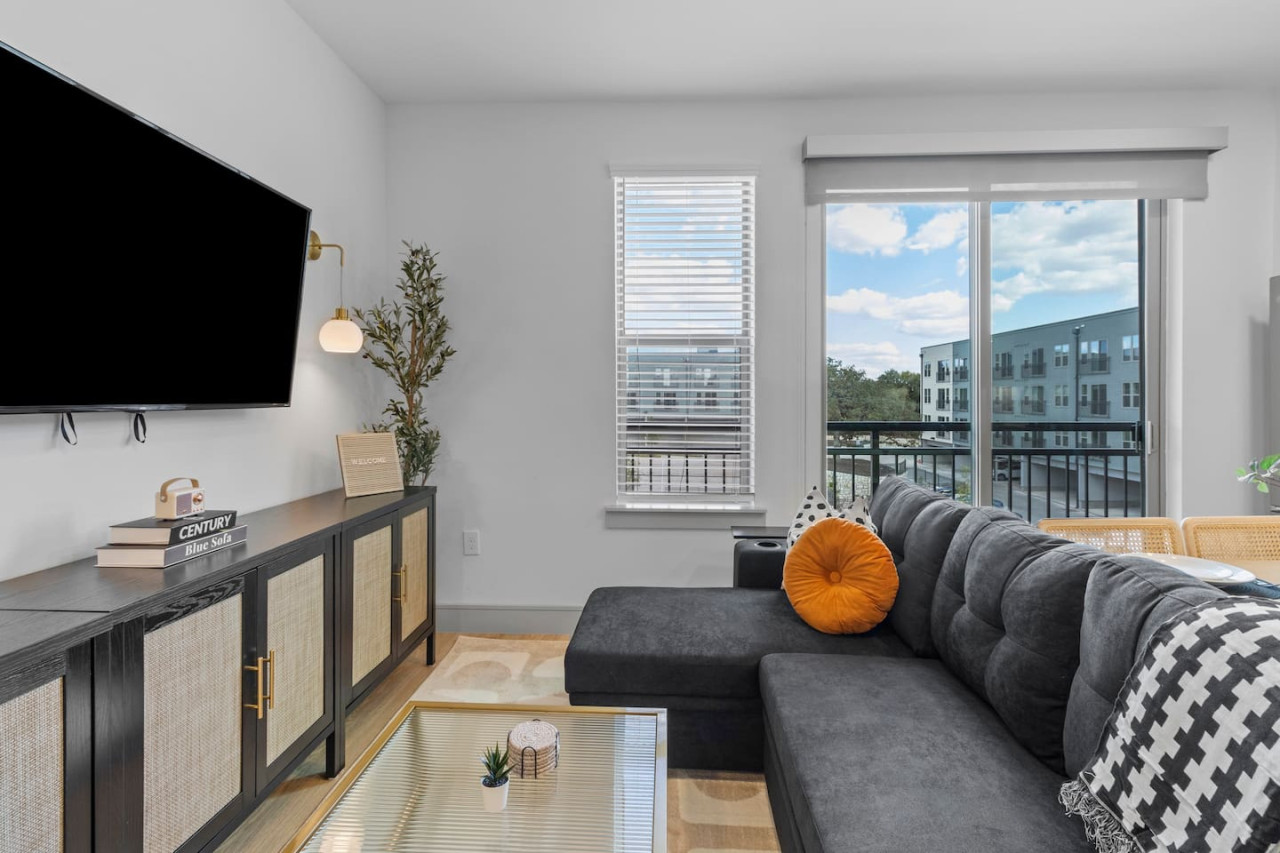 Relax in the living room and watch your favorite shows, lounging is a great way to unwind after a long day.