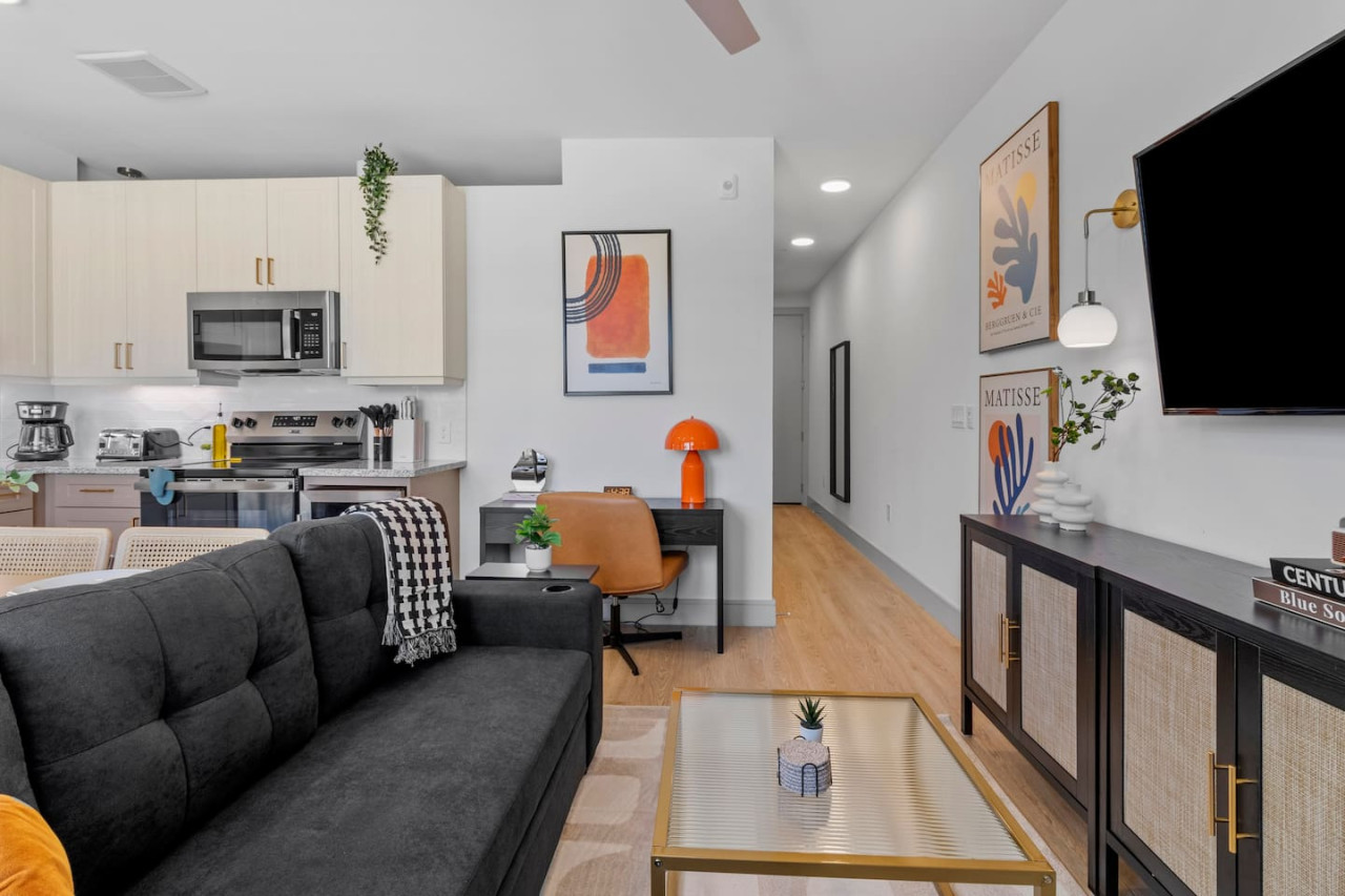 As you take a seat in the living room, the comfortable furniture and tasteful design make it easy to unwind.