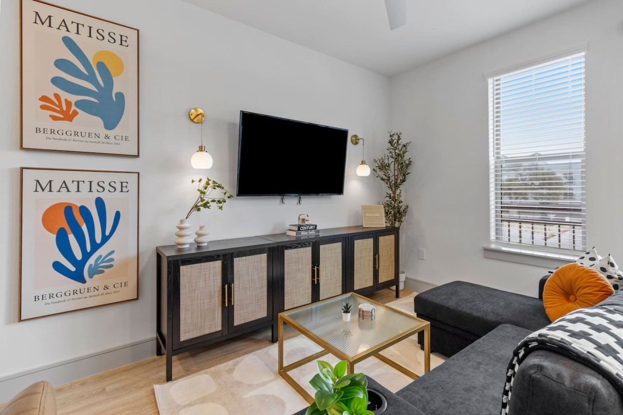 Relax in the living room and watch your favorite shows, lounging is a great way to unwind after a long day.