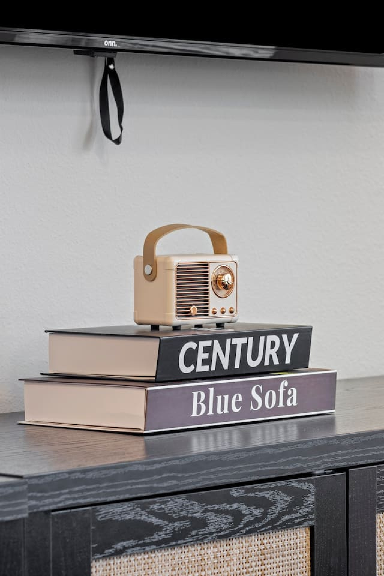Discover thoughtful touches throughout the home, like this curated selection of books and charming plants. These details add a cozy and inviting feel, making it easy to relax and unwind during your stay.