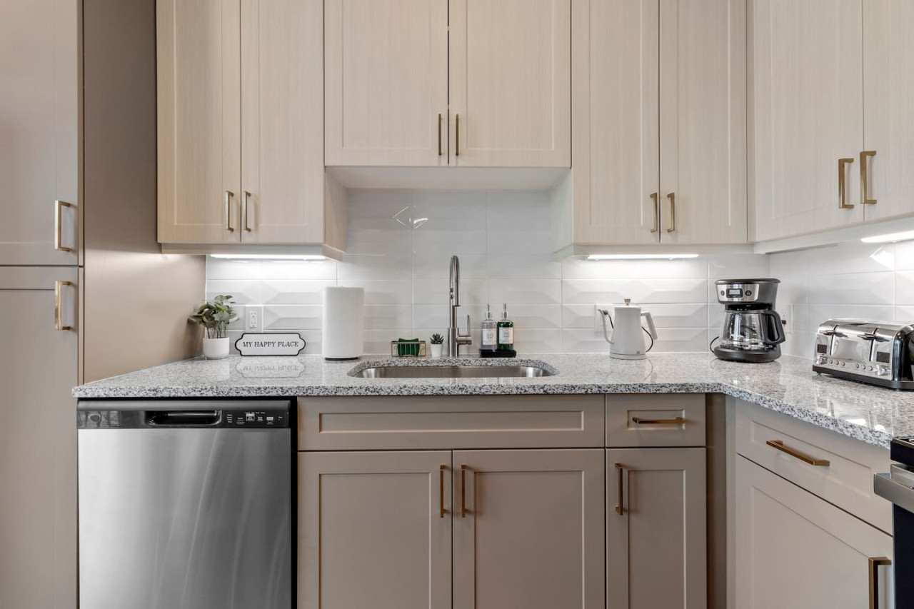 As you approach kitchen the elegant layout and well-stocked shelves make it the ideal spot to relax.