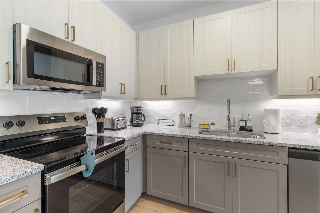 The kitchen invites you to experiment with new recipes, offering a stylish and practical space to cook and create.
