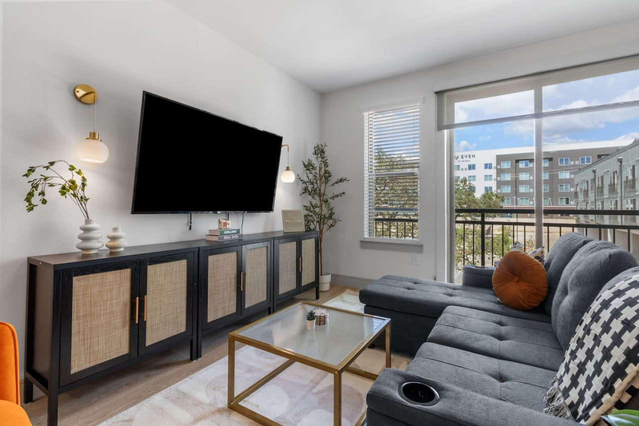 Relax in the living room and watch your favorite shows, lounging is a great way to unwind after a long day.