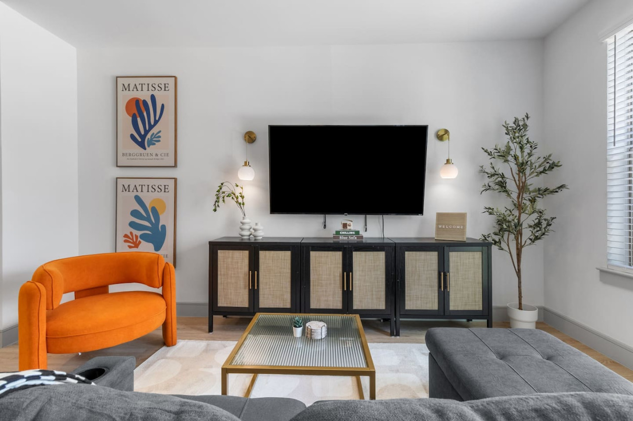 Relax in the living room and watch your favorite shows, lounging is a great way to unwind after a long day.