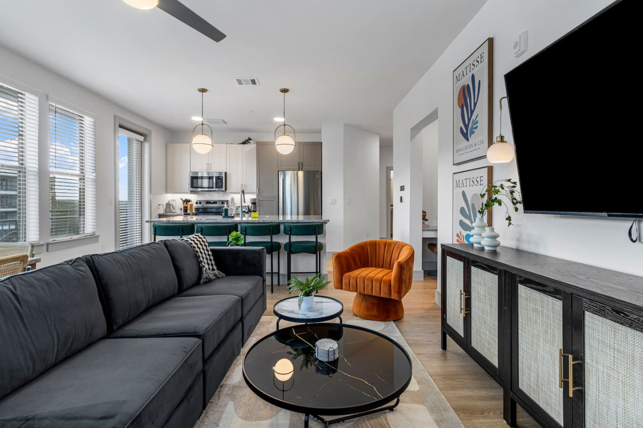Relax in the living room and watch your favorite shows, lounging is a great way to unwind after a long day.