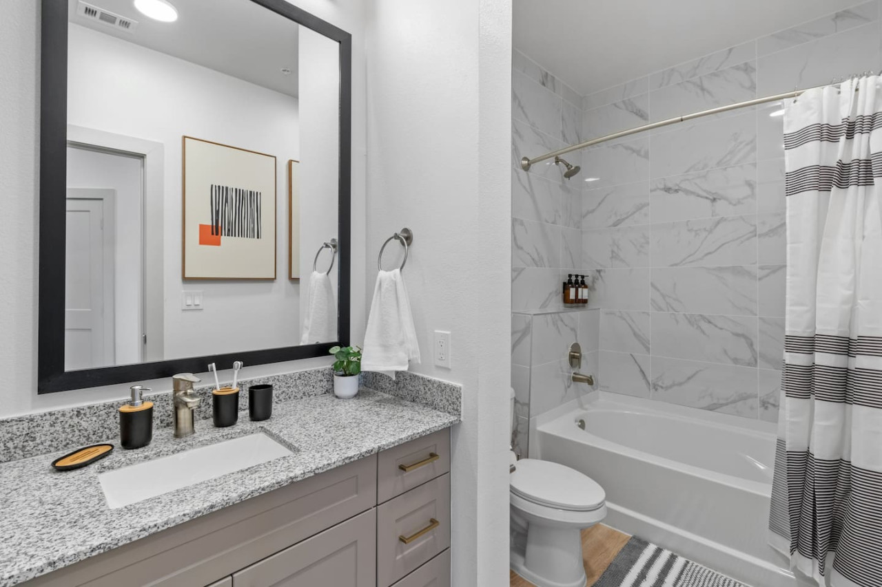 The bathroom is a private sanctuary, with a layout and features that make it the perfect place to rejuvenate.