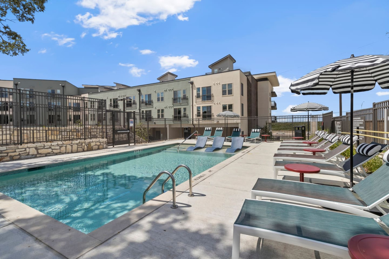 As you dip your toes into the cool water, the pool offers a refreshing retreat on a warm day.