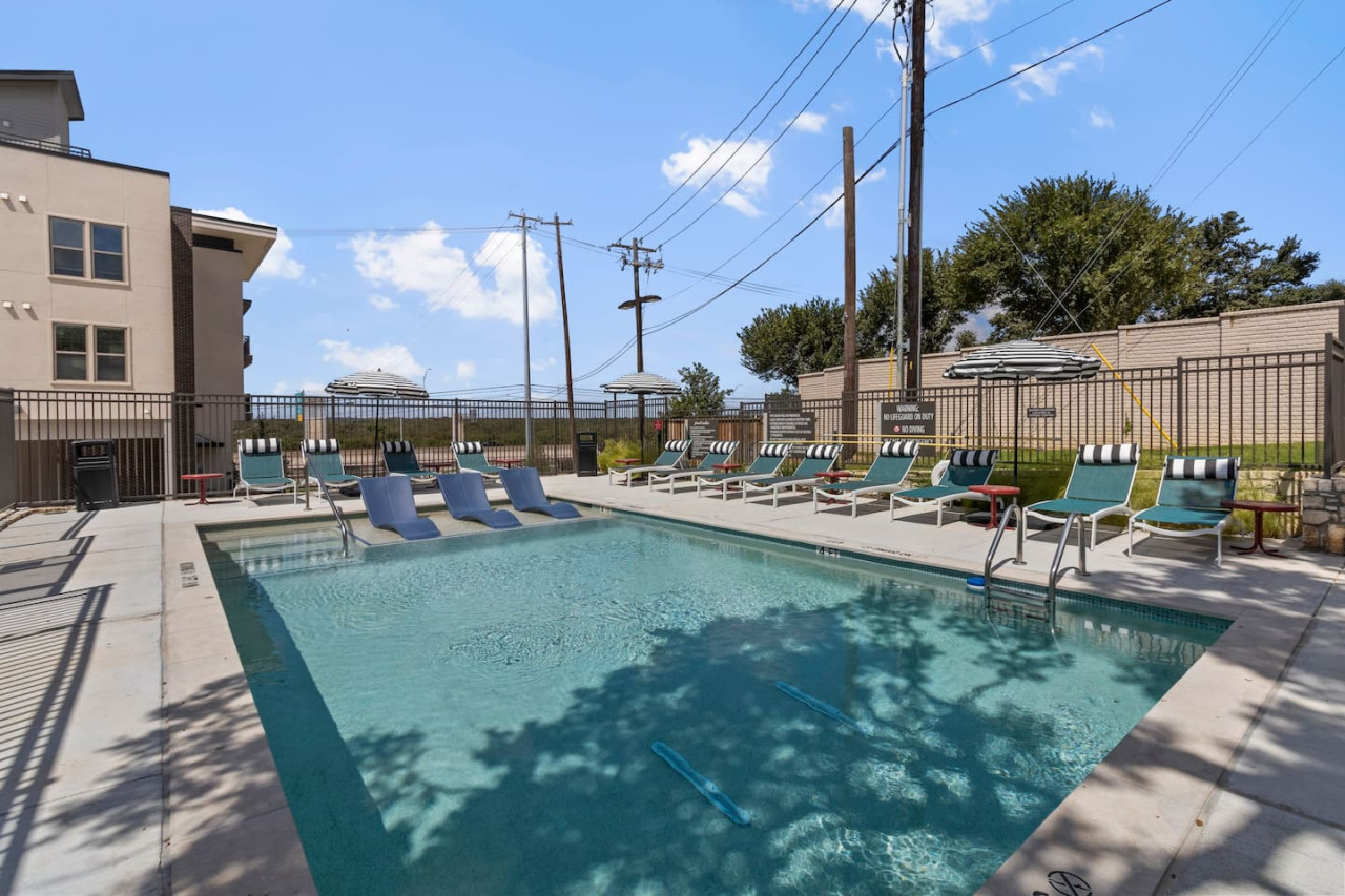 As you dip your toes into the cool water, the pool offers a refreshing retreat on a warm day.