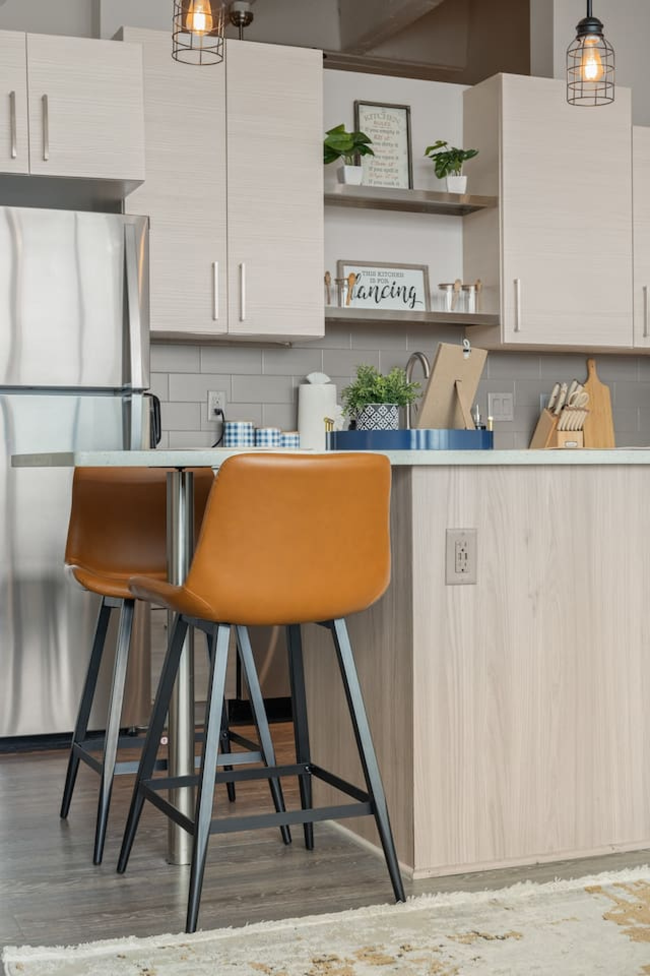 As you approach kitchen the elegant layout and well-stocked shelves make it the ideal spot to relax.