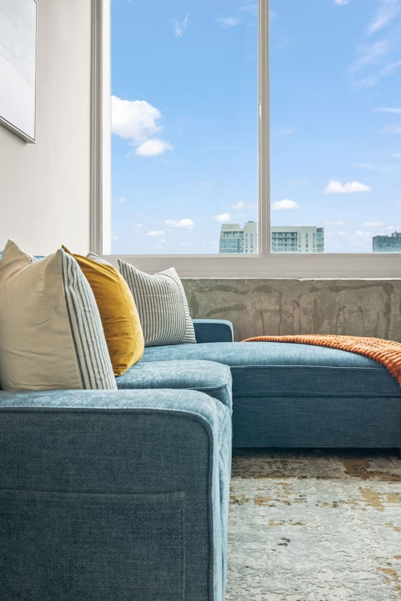 As you take a seat in the living room, the comfortable furniture and tasteful design make it easy to unwind.