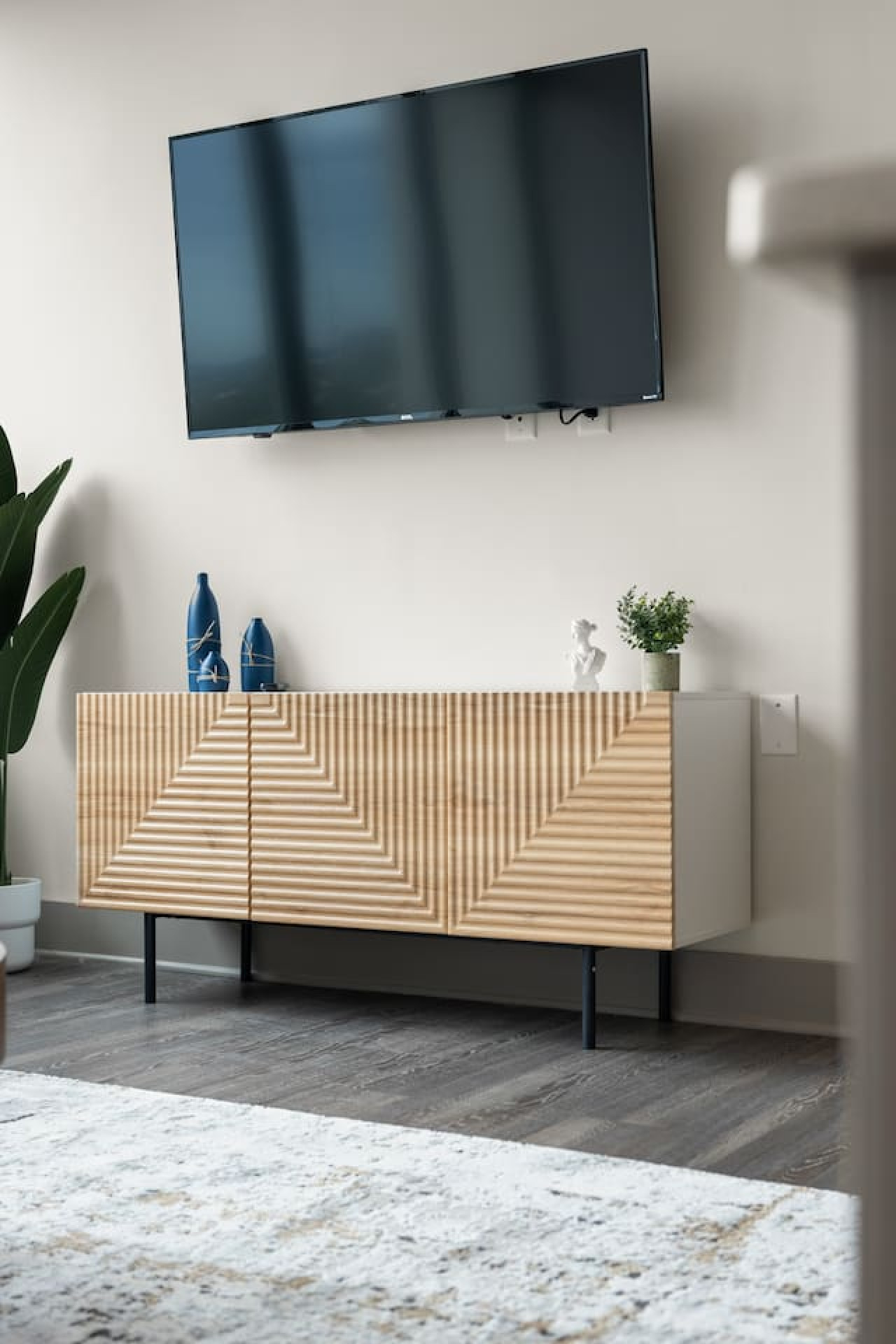 Relax in the living room and watch your favorite shows, lounging is a great way to unwind after a long day.