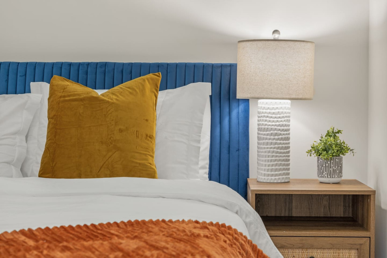As you enter the bedroom, the sophisticated decor and plush bedding create a space where you can truly unwind.