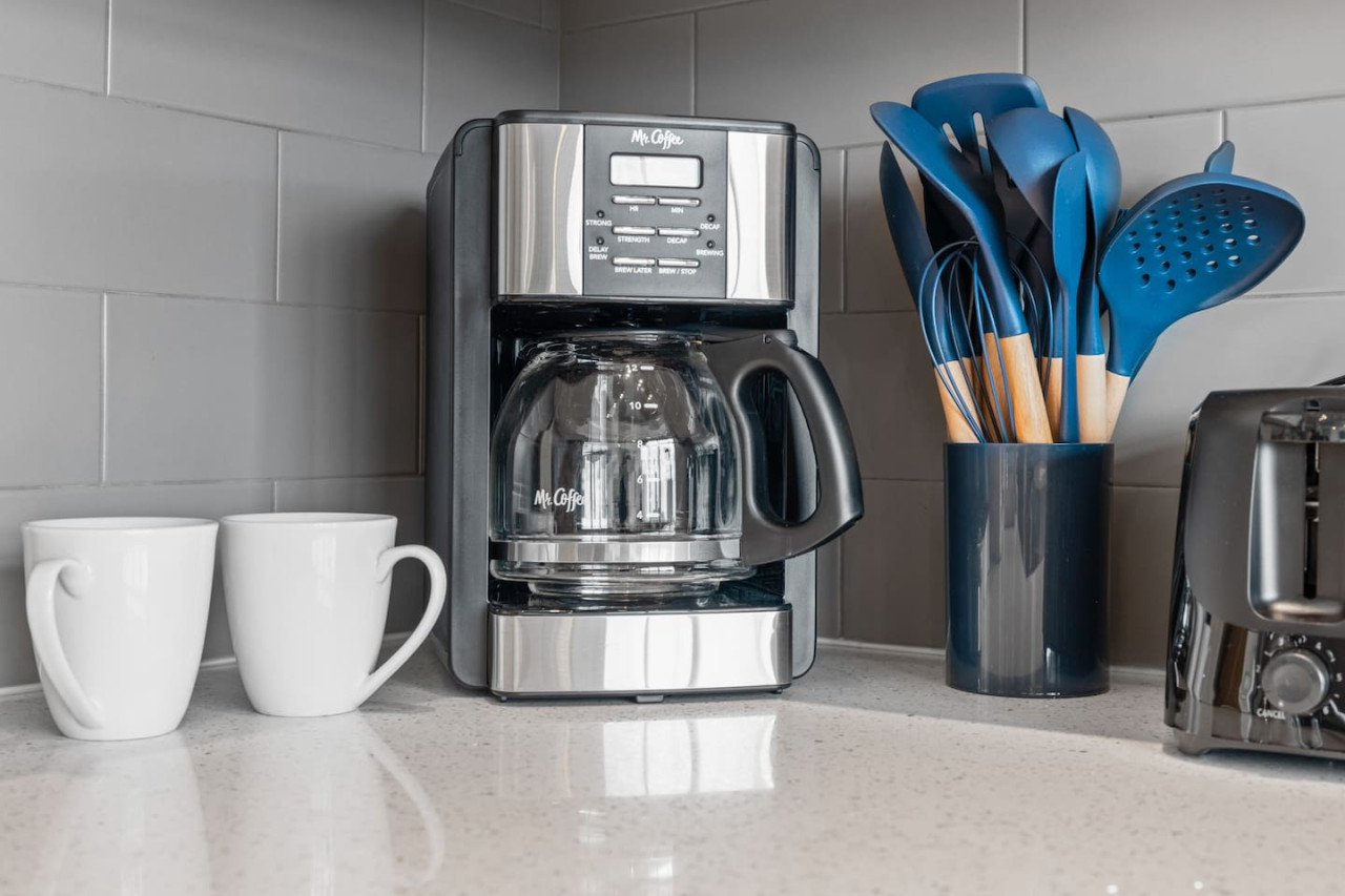 Fully equipped kitchen with all the tools you need for a perfect culinary experience. Enjoy the convenience of having everything at your fingertips!