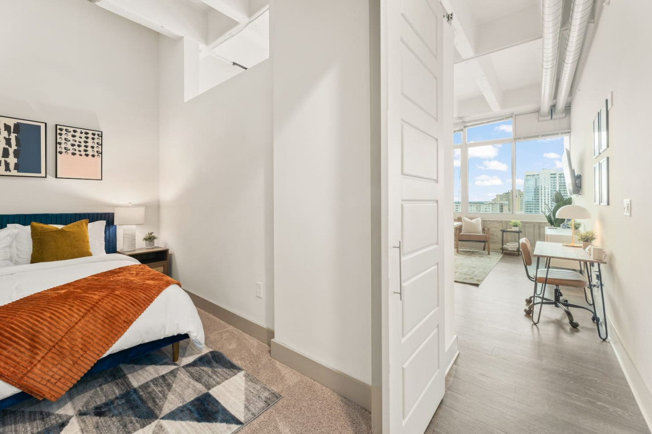As you enter the bedroom, the sophisticated decor and plush bedding create a space where you can truly unwind.