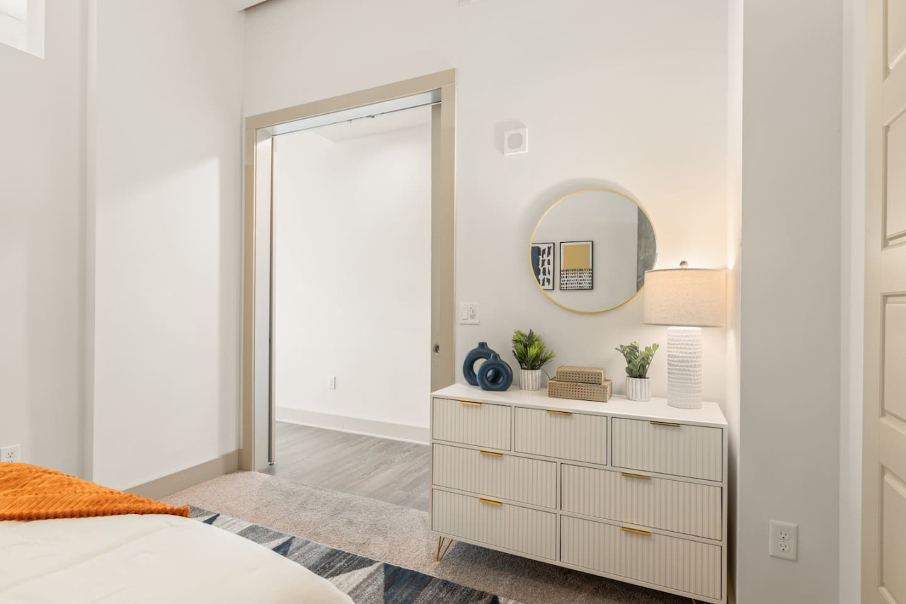 Spacious bedroom with stylish decor, perfect for unwinding after a day of exploring the local area.