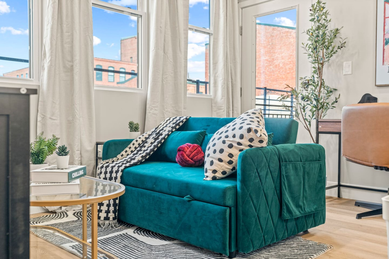 Relax in the living room and watch your favorite shows, lounging is a great way to unwind after a long day.