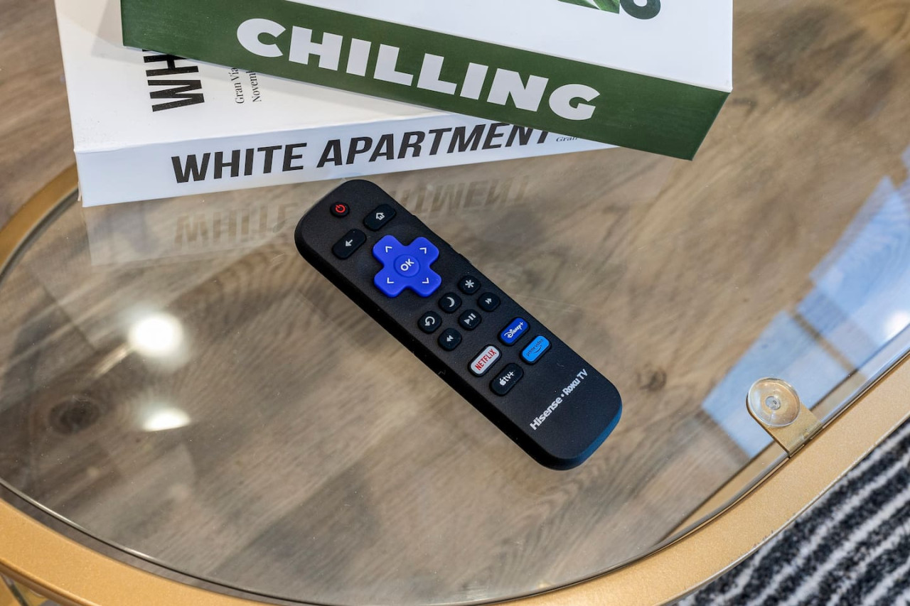 You feel a sense of peace as you step into the living room , with its inviting decor and soothing tones.