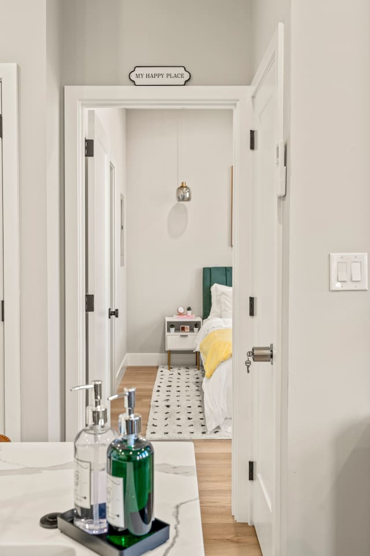 As you enter the bedroom, the comfortable bedding and peaceful atmosphere create the perfect retreat from the day.