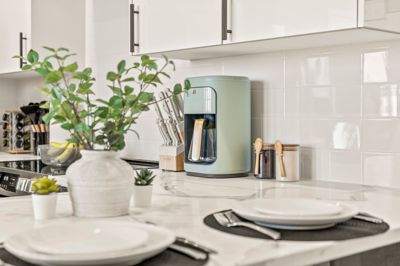 As you step into the kitchen, the clean lines and functional design make you eager to start cooking your favorite dishes.