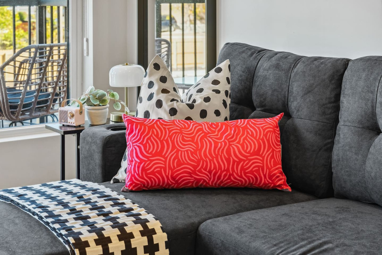 As you take a seat in the living room, the comfortable furniture and tasteful design make it easy to unwind.