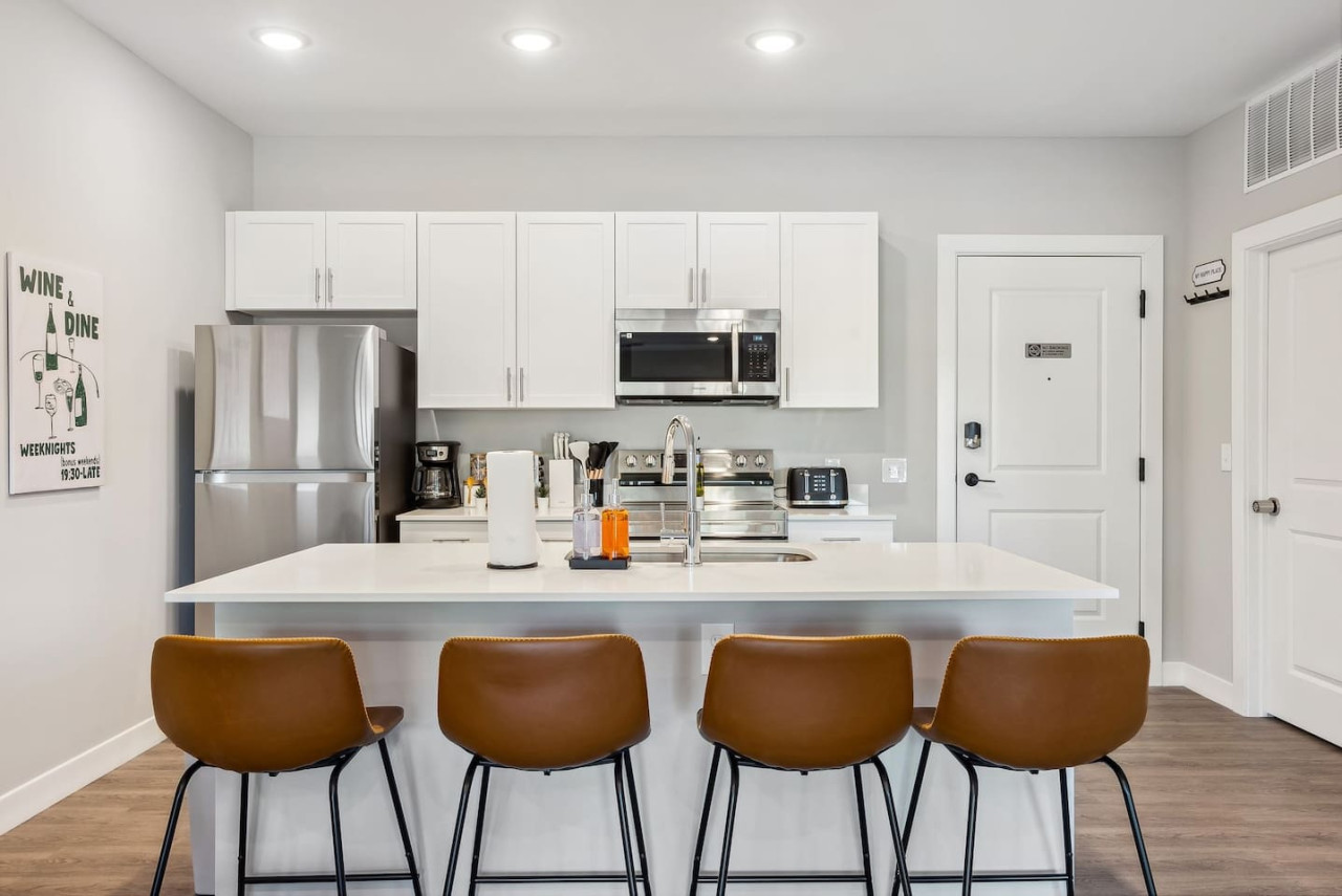 The dining area encourages you to gather with friends, enjoy a drink, and create lasting memories.