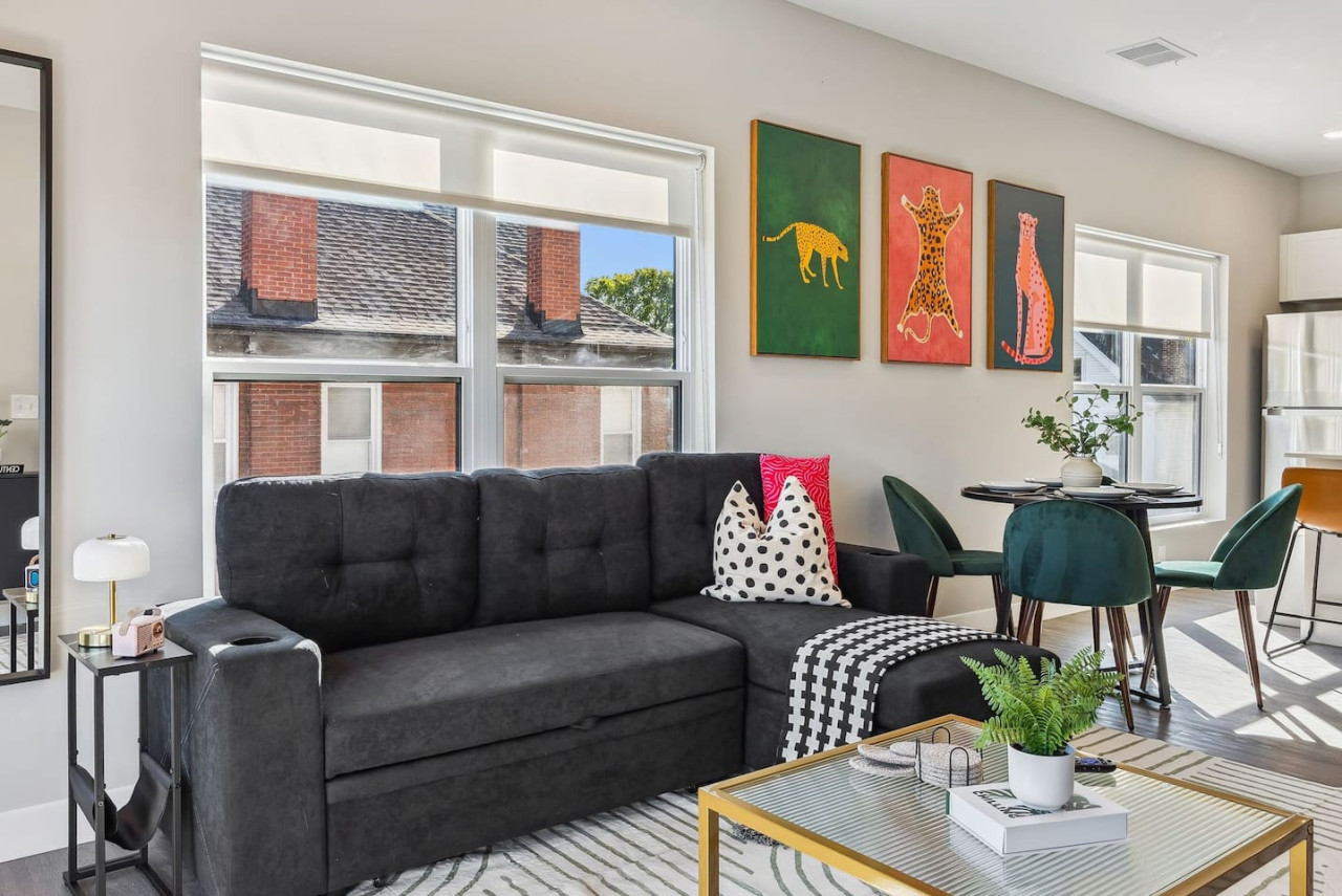 As you take a seat in the living room, the comfortable furniture and tasteful design make it easy to unwind.