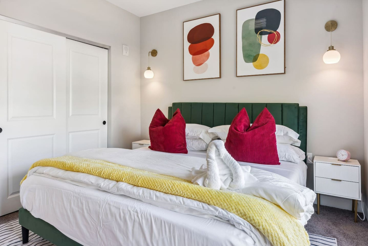 The king bedroom offers a luxurious retreat, with a bed that promises restful nights and a room that feels like a private oasis.