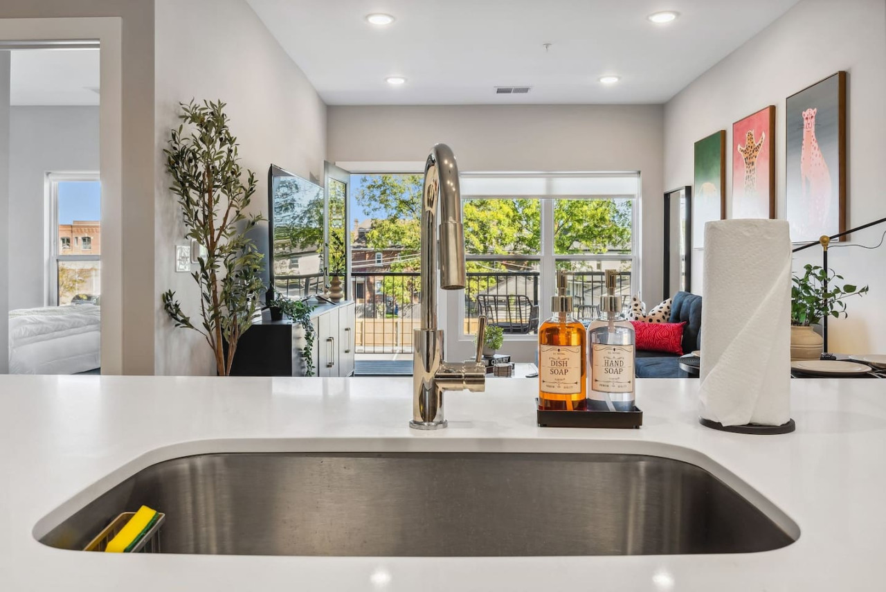 The kitchen’s open layout allows you to move freely as you prepare meals, with everything you need at your fingertips.