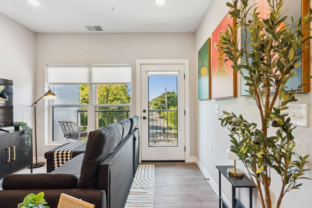As you take a seat in the living room, the comfortable furniture and tasteful design make it easy to unwind.