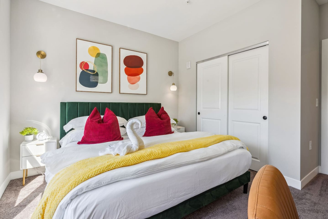 The king bed is the centerpiece of the room, offering a plush and inviting space where you can rest and recharge.