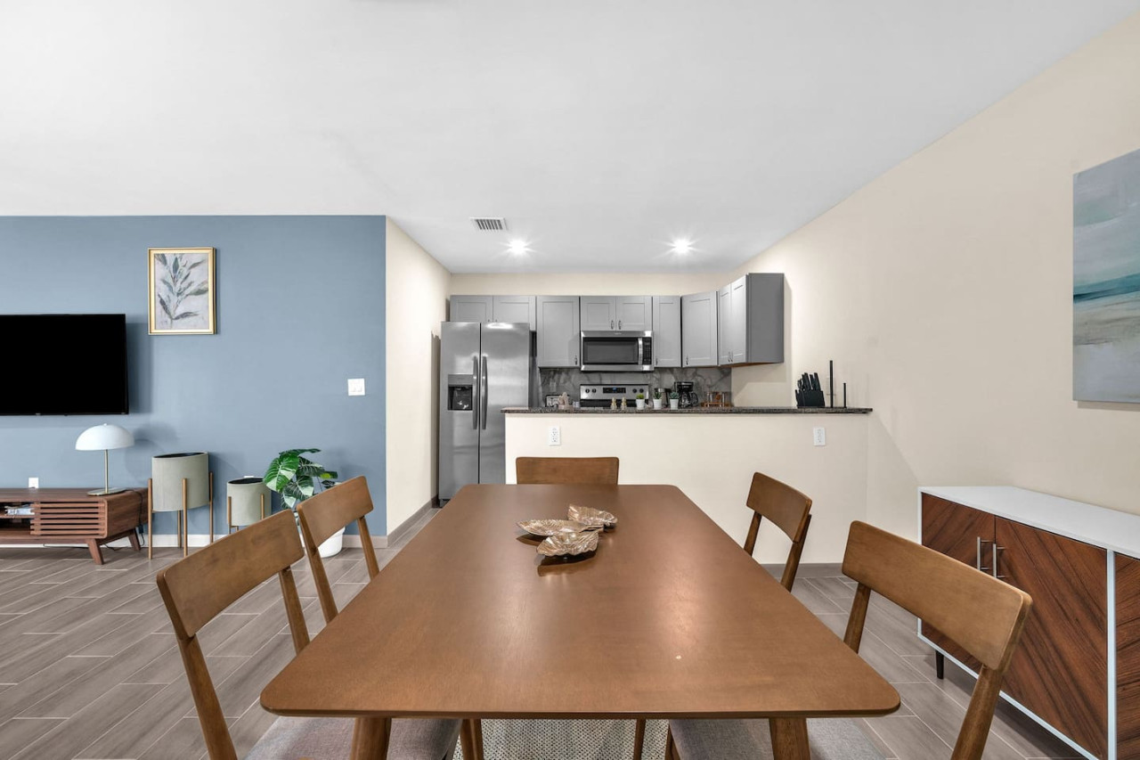 The dining area invites you to savor every moment, whether enjoying a quiet meal or hosting a festive gathering.
