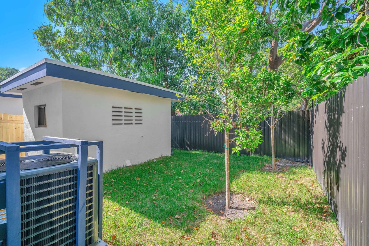 The outdoor area is a blend of modern and classic design elements, creating a welcoming and stylish facade.
