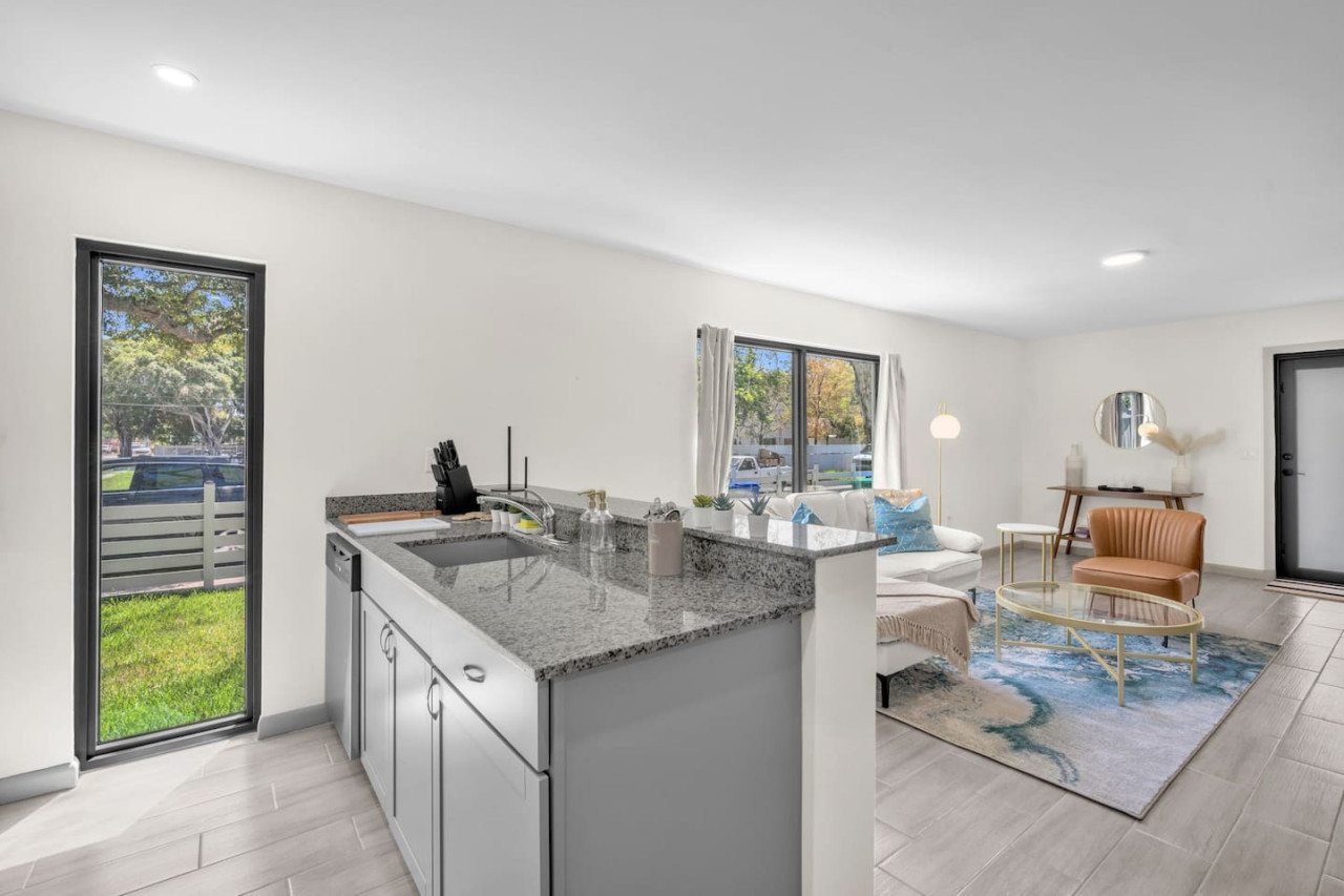 Bright and open kitchen layout with seamless integration into the living space, perfect for entertaining.