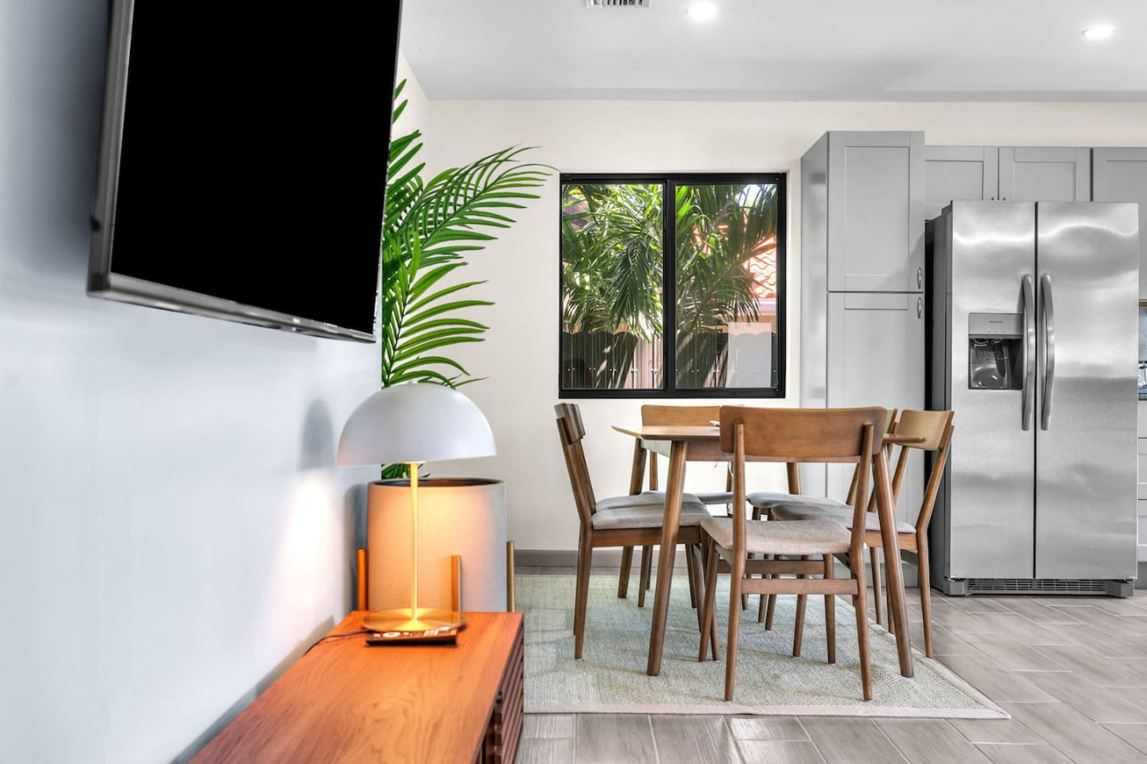 Compact yet stylish dining setup, perfectly situated near the kitchen.