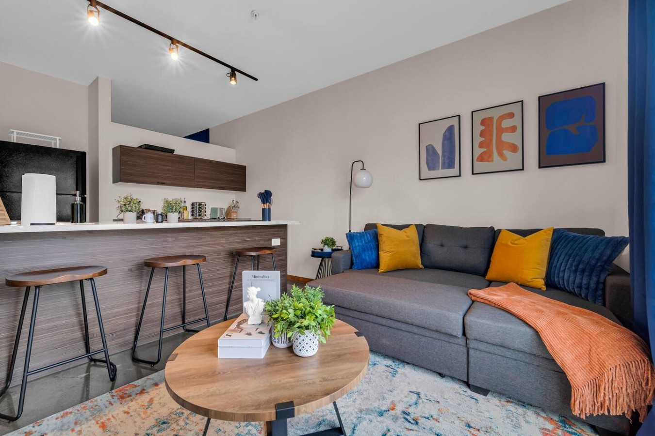 As you take a seat in the living room, the comfortable furniture and tasteful design make it easy to unwind.