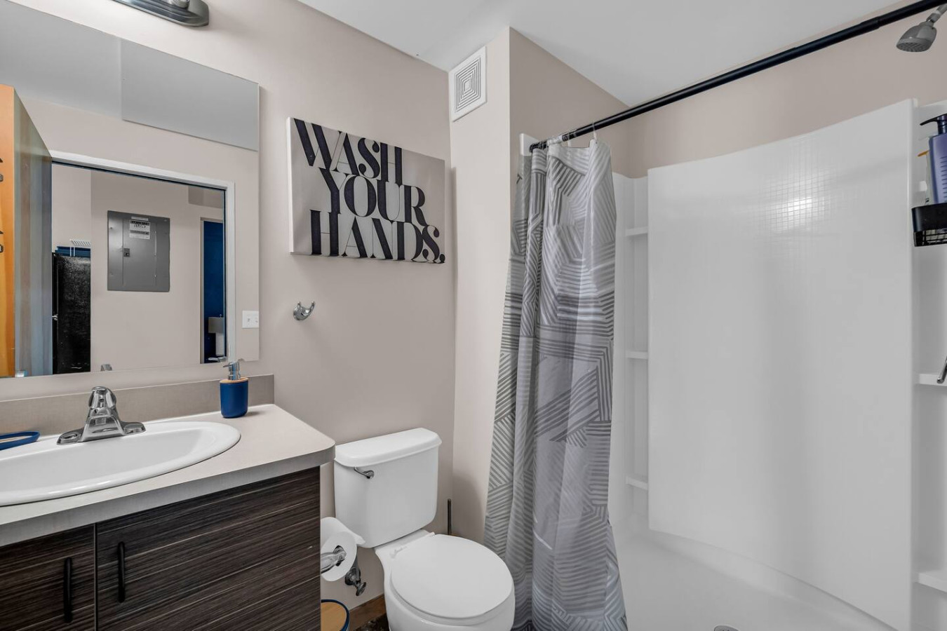 You feel a sense of calm as you enter the bathroom, where the thoughtful design and high-quality materials create a serene environment.