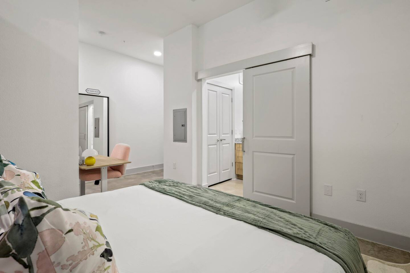 Spacious bedroom with stylish decor, perfect for unwinding after a day of exploring the local area.