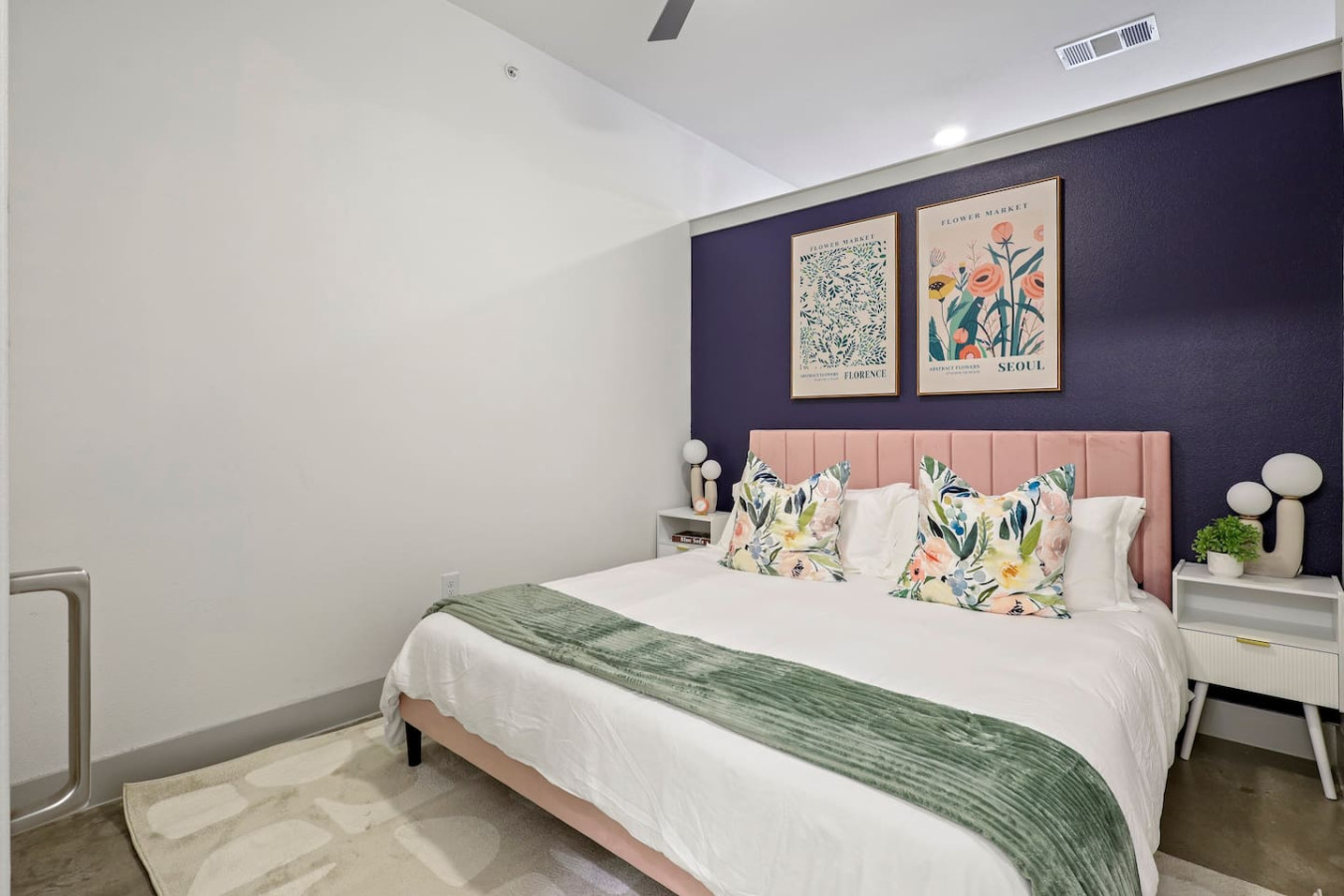 The bedroom offers a luxurious retreat, with a bed that promises restful nights and a room that feels like a private oasis.