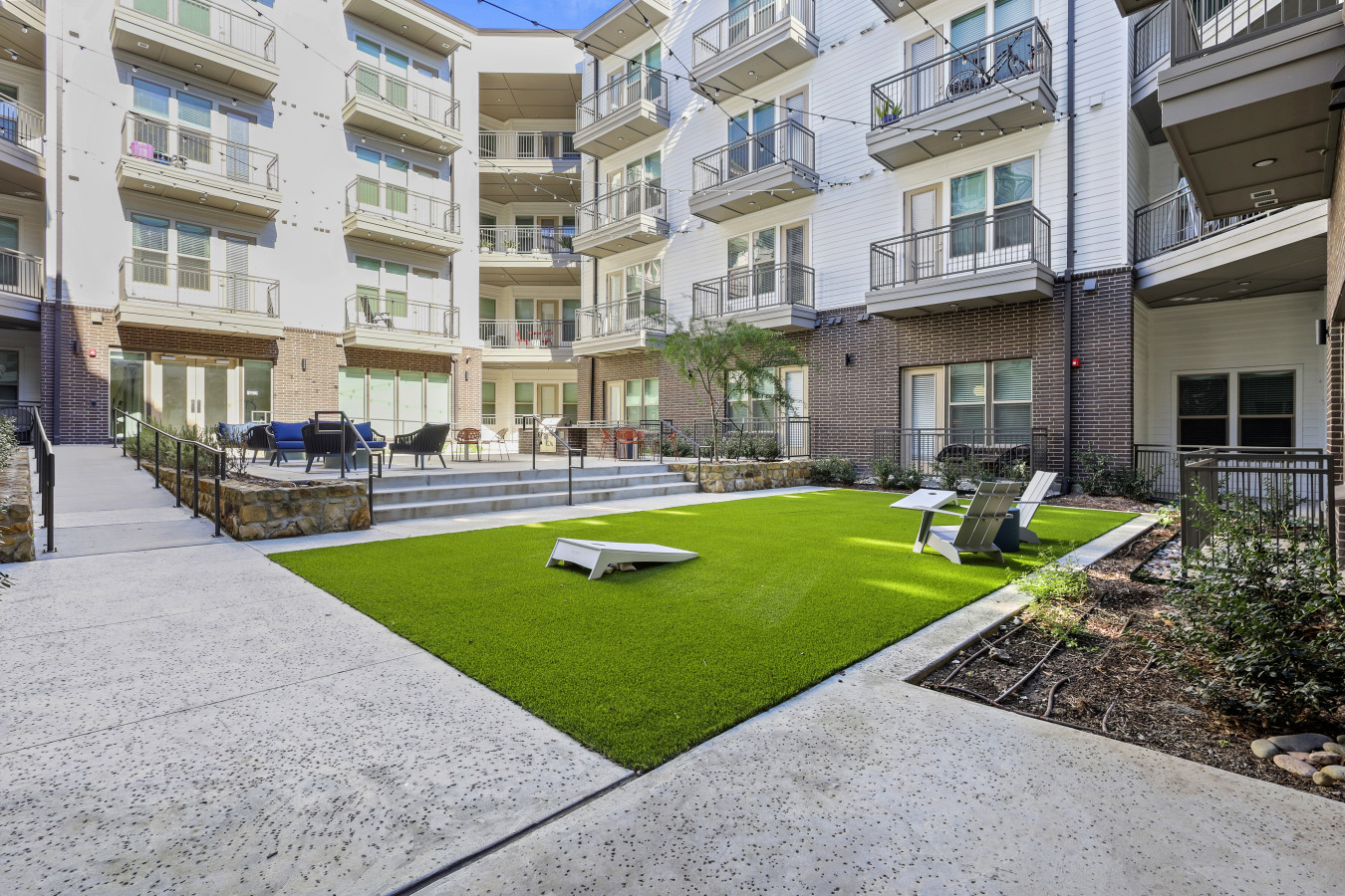 The house’s exterior is a blend of modern and classic design elements, creating a welcoming and stylish facade.