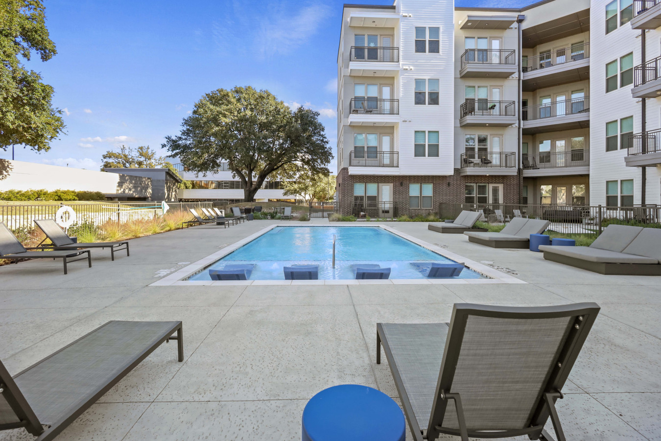As you dip your toes into the cool water, the pool offers a refreshing retreat on a warm day.