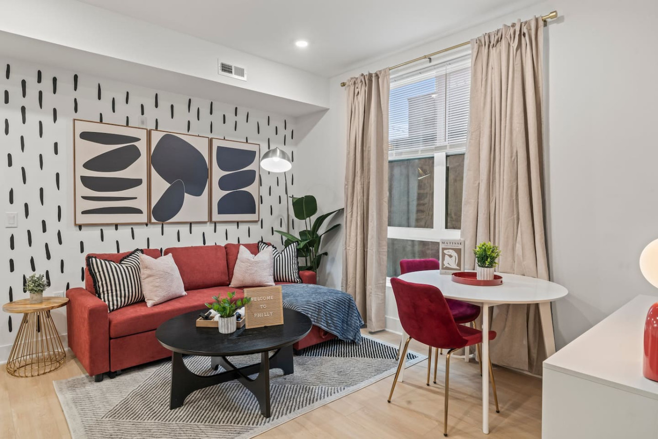 You feel a sense of peace as you step into the living room , with its inviting decor and soothing tones.
