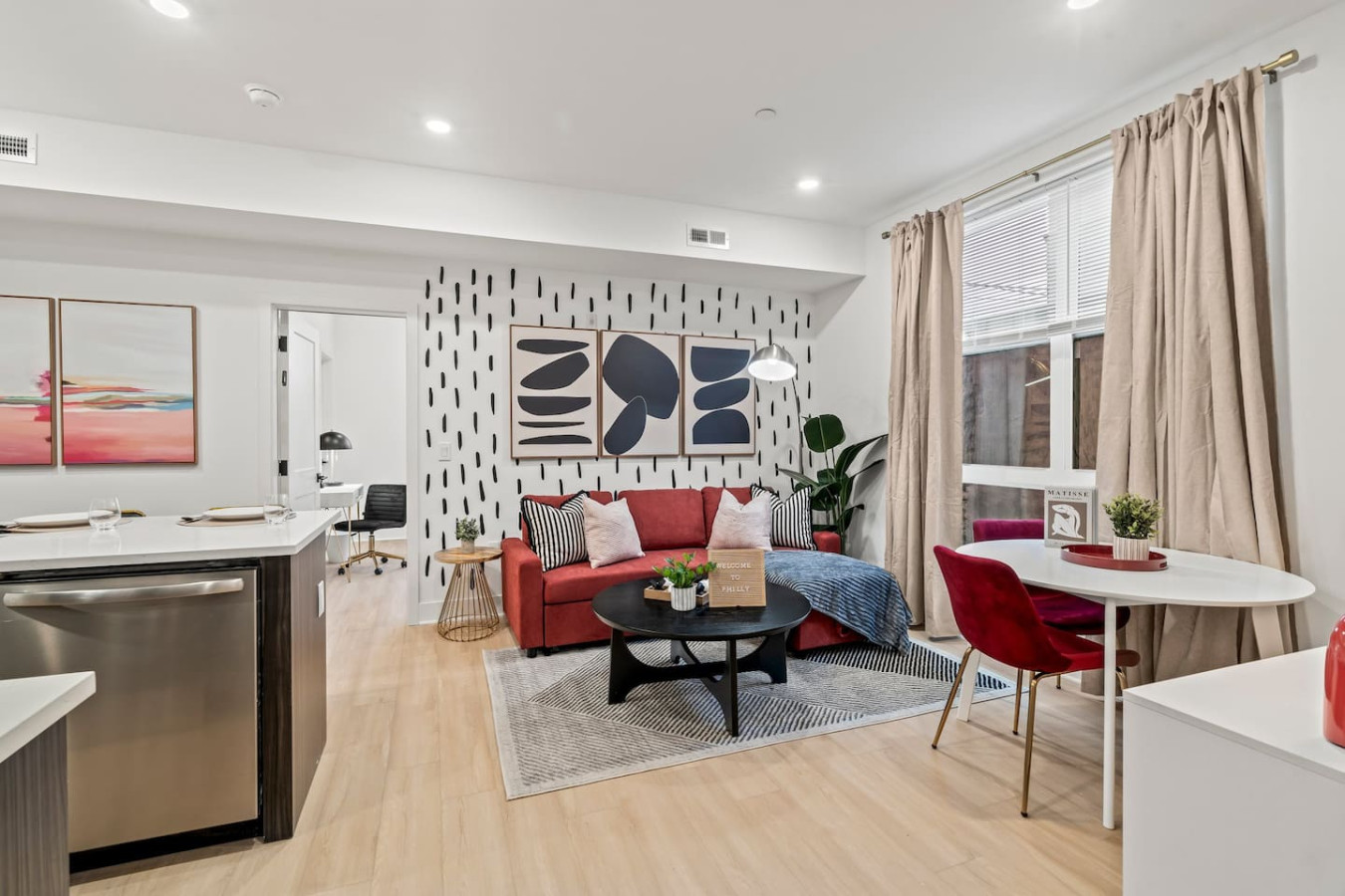 You feel a sense of peace as you step into the living room , with its inviting decor and soothing tones.
