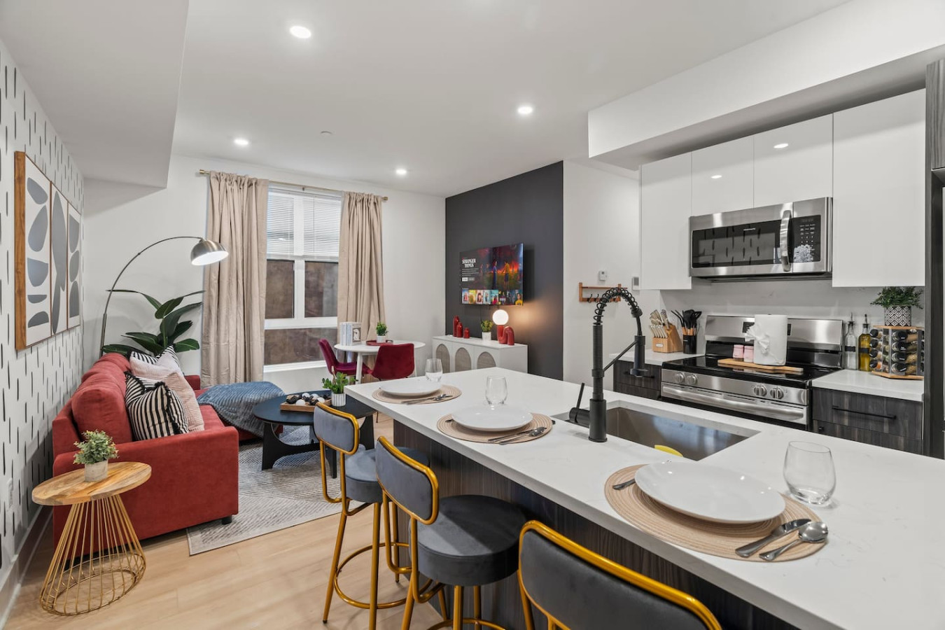 Counter Height Dining for Four with a view into Living Room