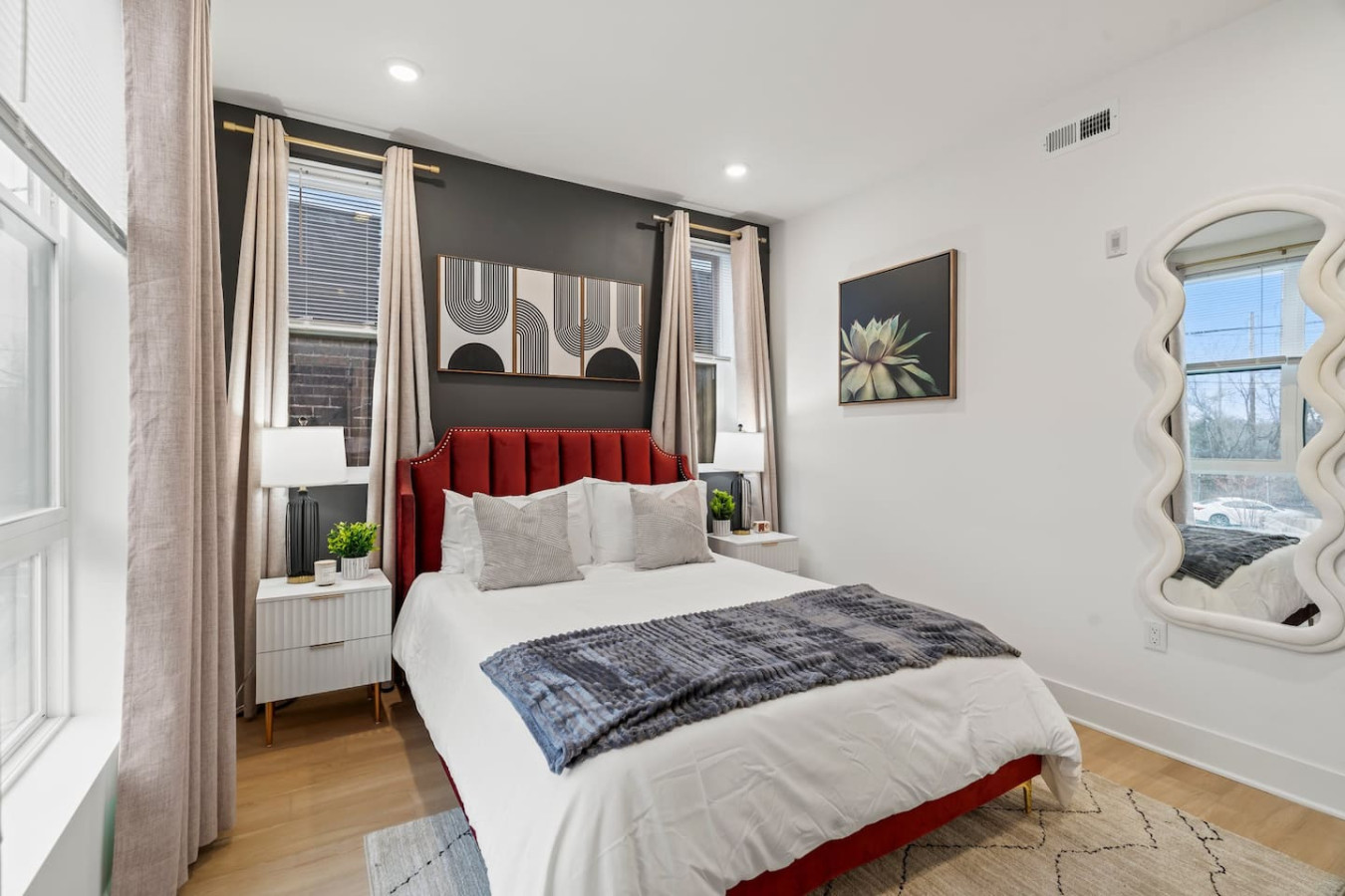 Luxurious Queen Bed with Side Tables & Night Lights. Blinds & Blackout Drapes to ensure a restful sleep. Full Length Mirror