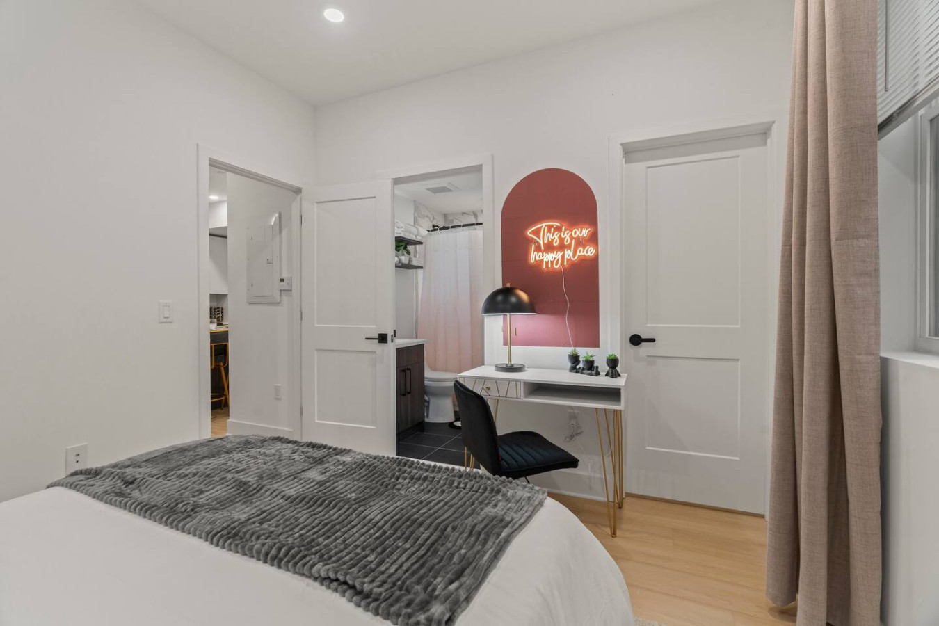 As you enter the bedroom, the comfortable bedding and peaceful atmosphere create the perfect retreat from the day.