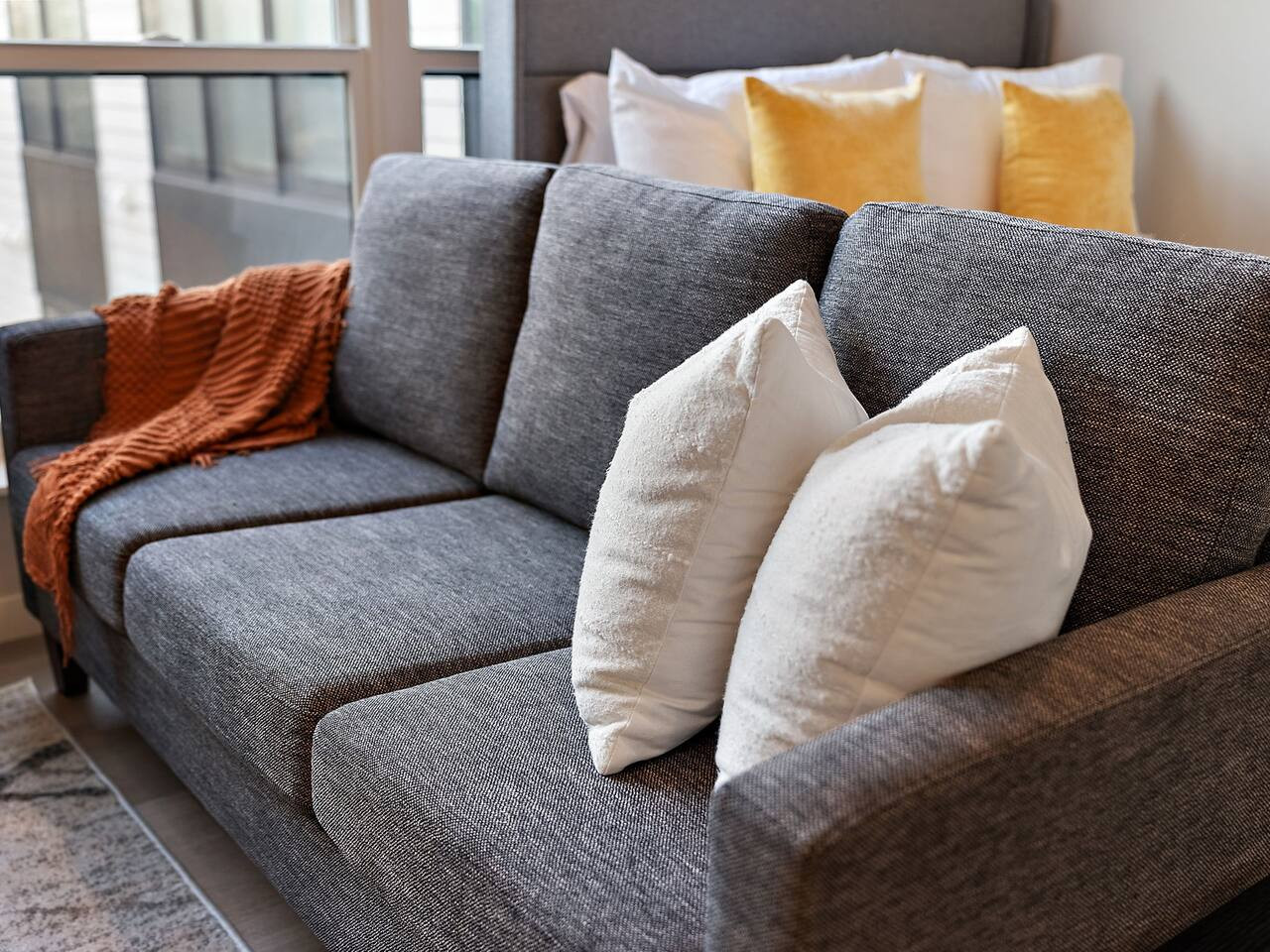 As you take a seat in the living room, the comfortable furniture and tasteful design make it easy to unwind.