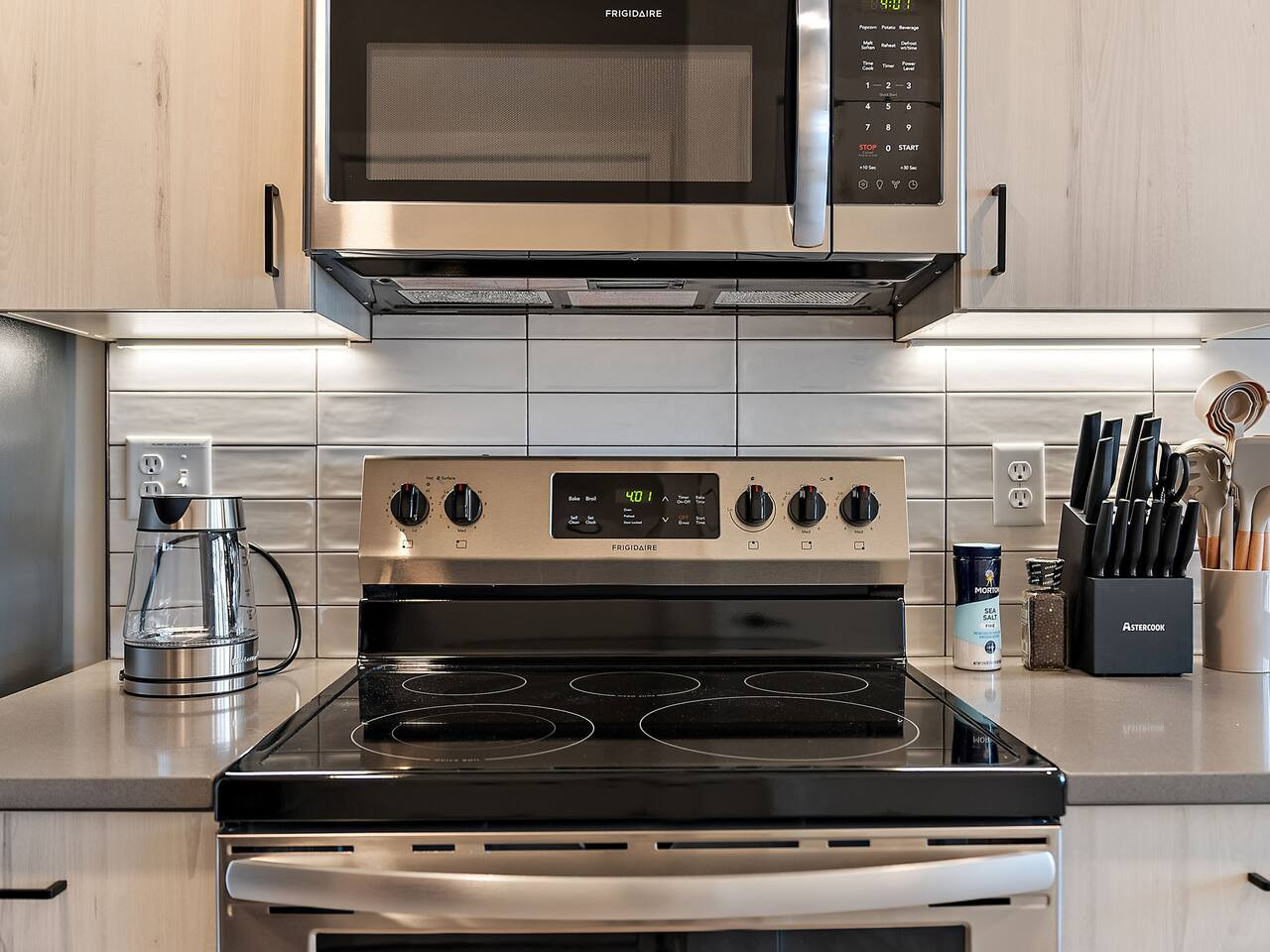 The kitchen invites you to experiment with new recipes, offering a stylish and practical space to cook and create.
