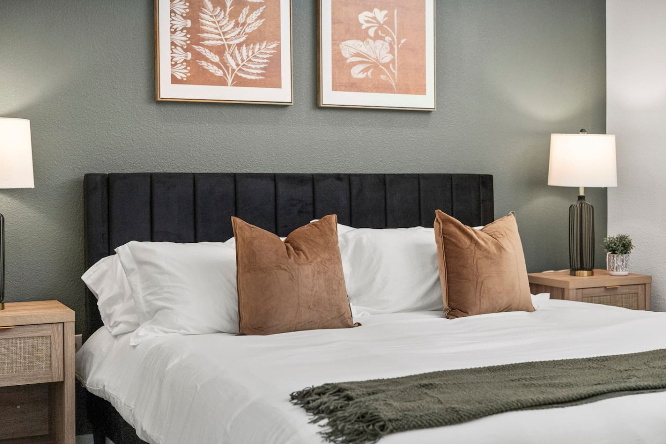 The bedroom’s serene ambiance invites you to relax, with a plush bed that promises a restful night's sleep.